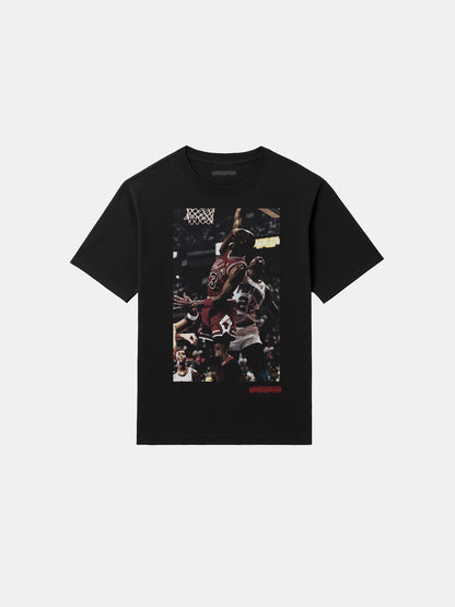 Black t-shirt with graphic design on a white background