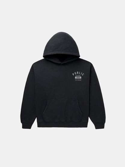 Black hoodie with a logo on the chest against a white background